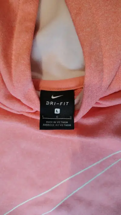 Polerón Nike Dri-Fit rosado con capucha - miniatura 1