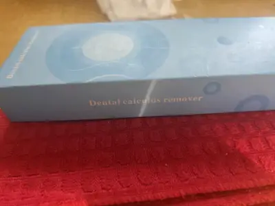 Removedor de sarro dental eléctrico portátil - miniatura 3