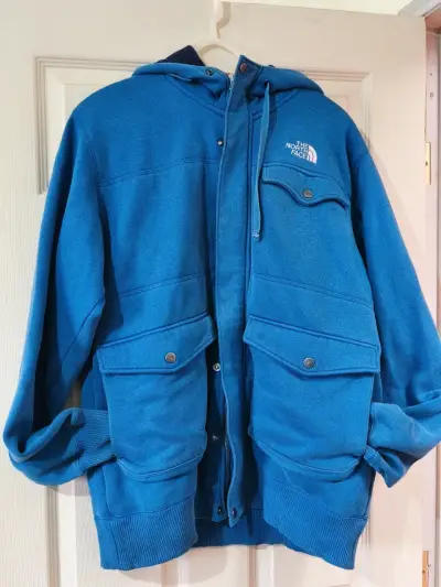 Chaqueta azul con capucha The North Face - miniatura 1