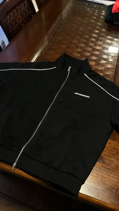 Chaqueta deportiva negra con cierre musero - miniatura 1