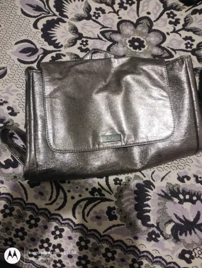 Mochila metálica plateada elegante - miniatura 1