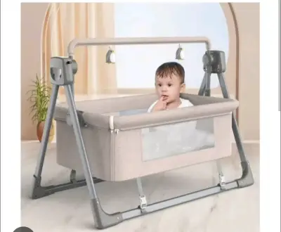 Cuna mecedora plegable con control remoto - miniatura 2