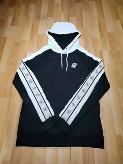 Polerón con capucha SikSilk negro y blanco - miniatura 1