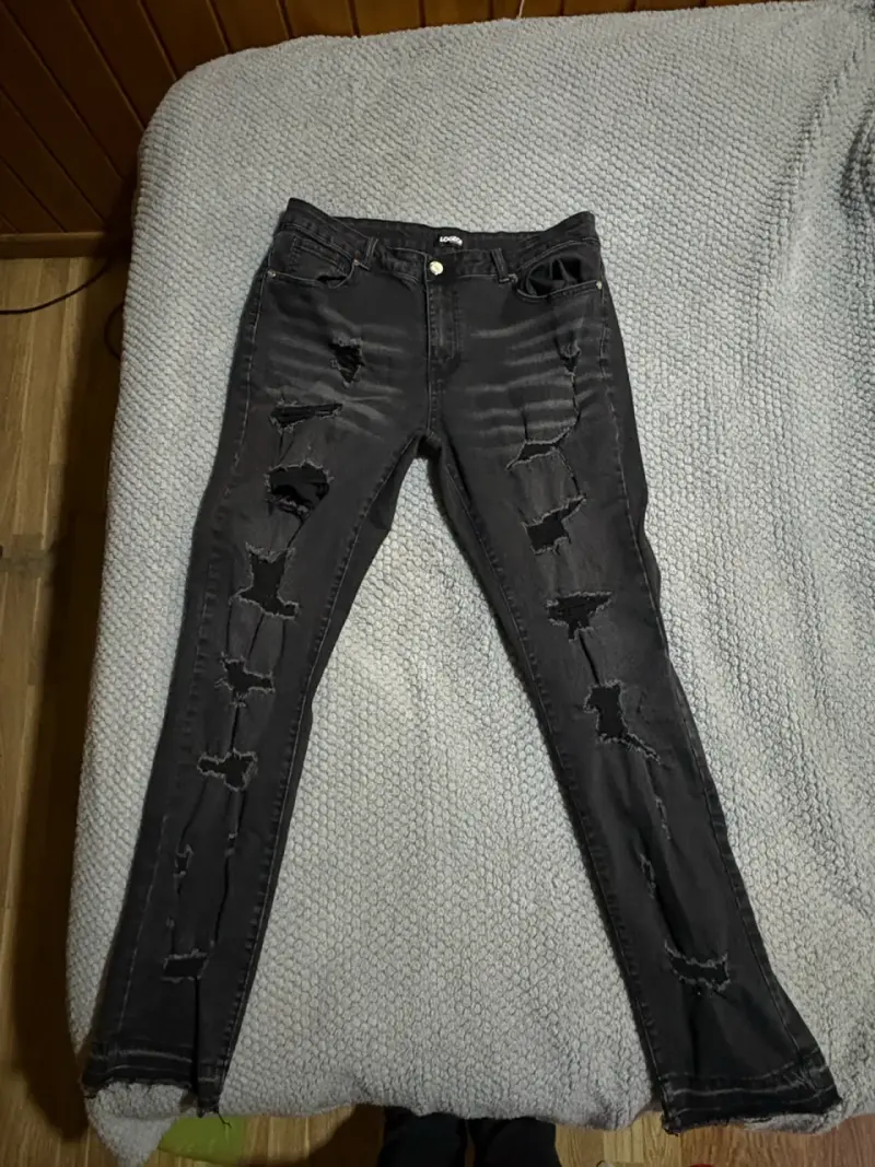 Jeans negros rasgados para hombre - 1