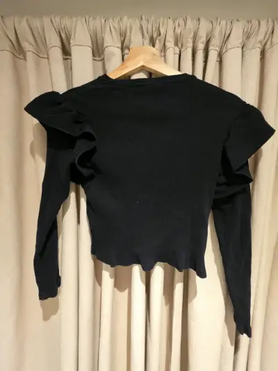 Polera negra con volantes para niña Zara - miniatura 2