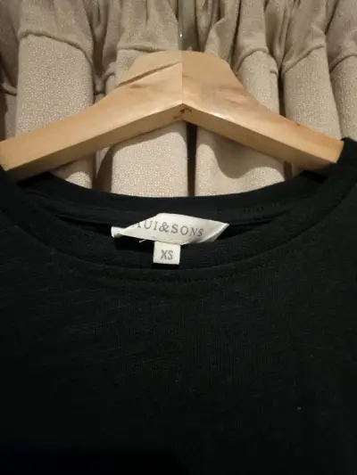 Polera negra sin mangas para mujer - miniatura 2
