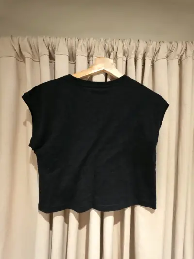 Polera negra sin mangas para mujer - miniatura 3