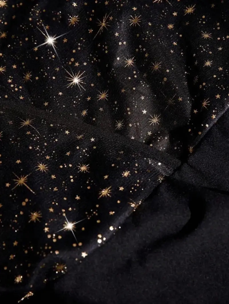 Enterito negro con mangas transparentes y diseño de estrellas - 4