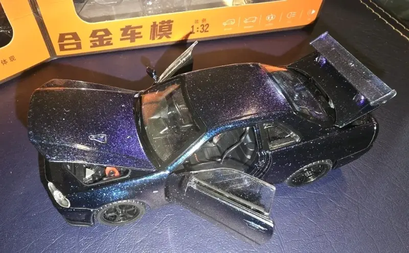 Auto juguete  Nissan Skyline GTR R34 1:32 - 3