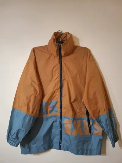 Cortavientos XSXS bicolor con capucha - miniatura 1
