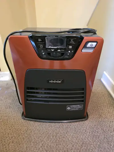 Estufa Toyotomi de parafina roja - miniatura 1