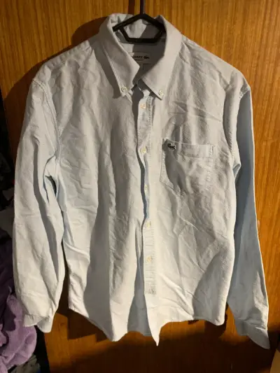 Camisa Lacoste  celeste de hombre regular fit - miniatura 1