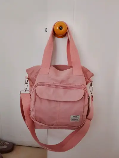 Bolso tote rosa con múltiples compartimentos - miniatura 1