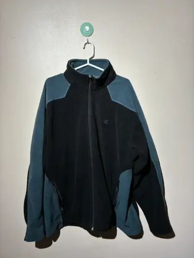 ♻️Chaqueta polar Champion negra y azul - miniatura 1