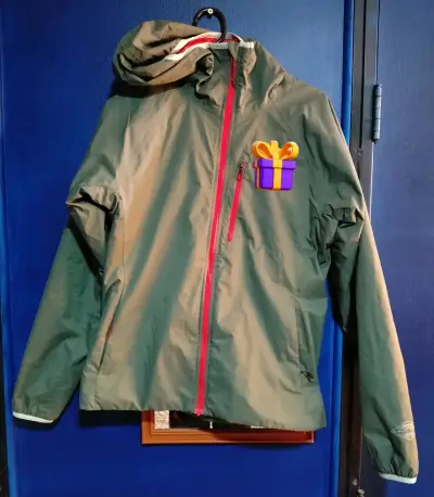 Chaqueta impermeable Columbia verde con capucha - miniatura 1
