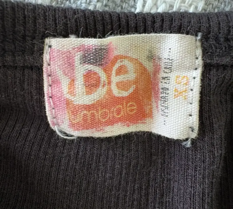 Polera sin mangas negra con botones Umbrale - 3