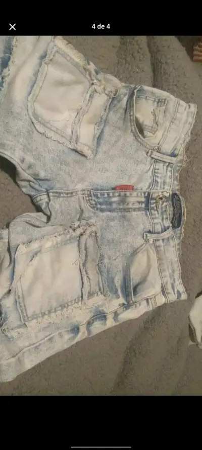 Jeans desgastados de mezclilla clara para mujer - miniatura 1