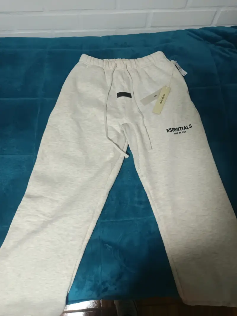 Pantalones Essentials Fear of God color crema - 1