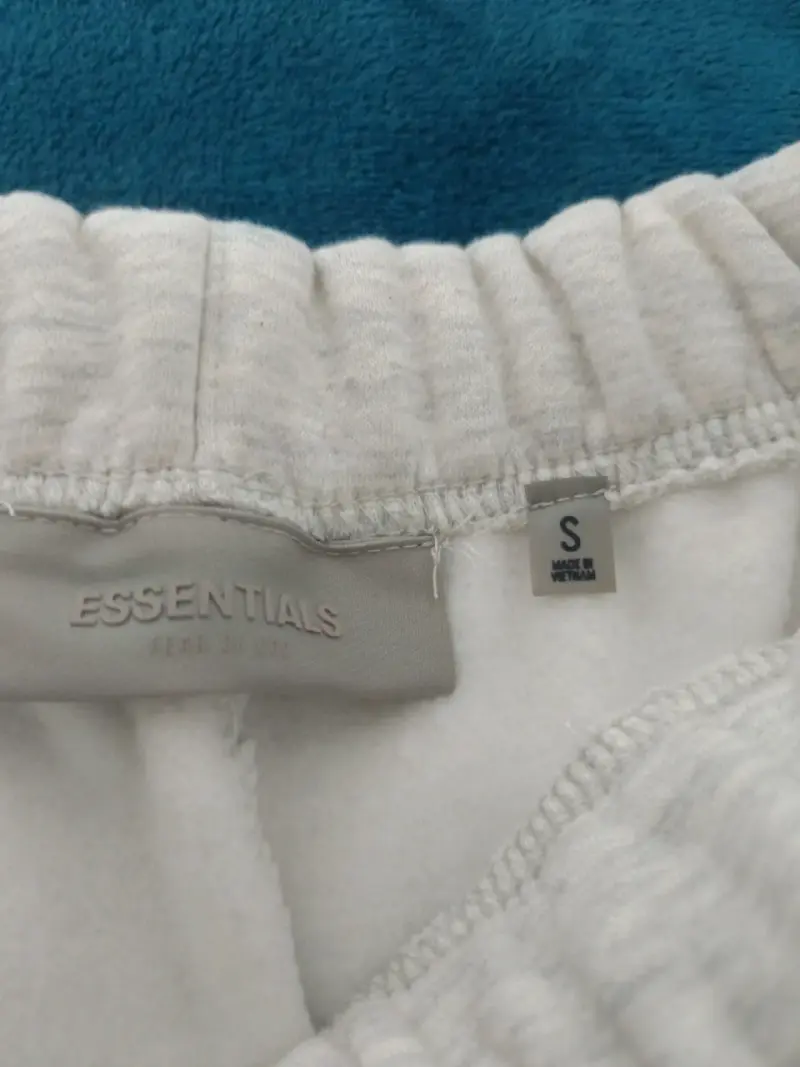 Pantalones Essentials Fear of God color crema - 4