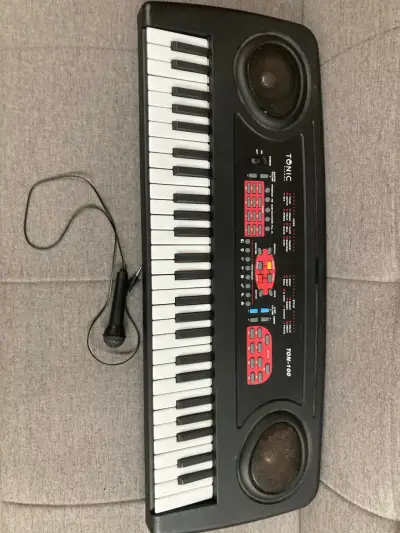 Teclado electrónico Tonic TON-100 con micrófono - miniatura 1