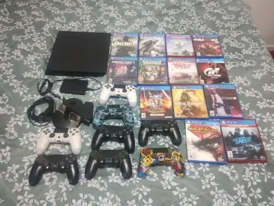 Consola PS4 con 12 juegos y 5 controles - miniatura 1