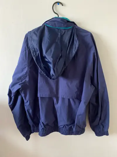 Chaqueta cortaviento azul WinnerMate con capucha - miniatura 4