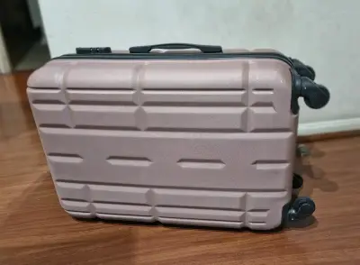 Maleta rígida con ruedas giratorias color rosa - miniatura 1