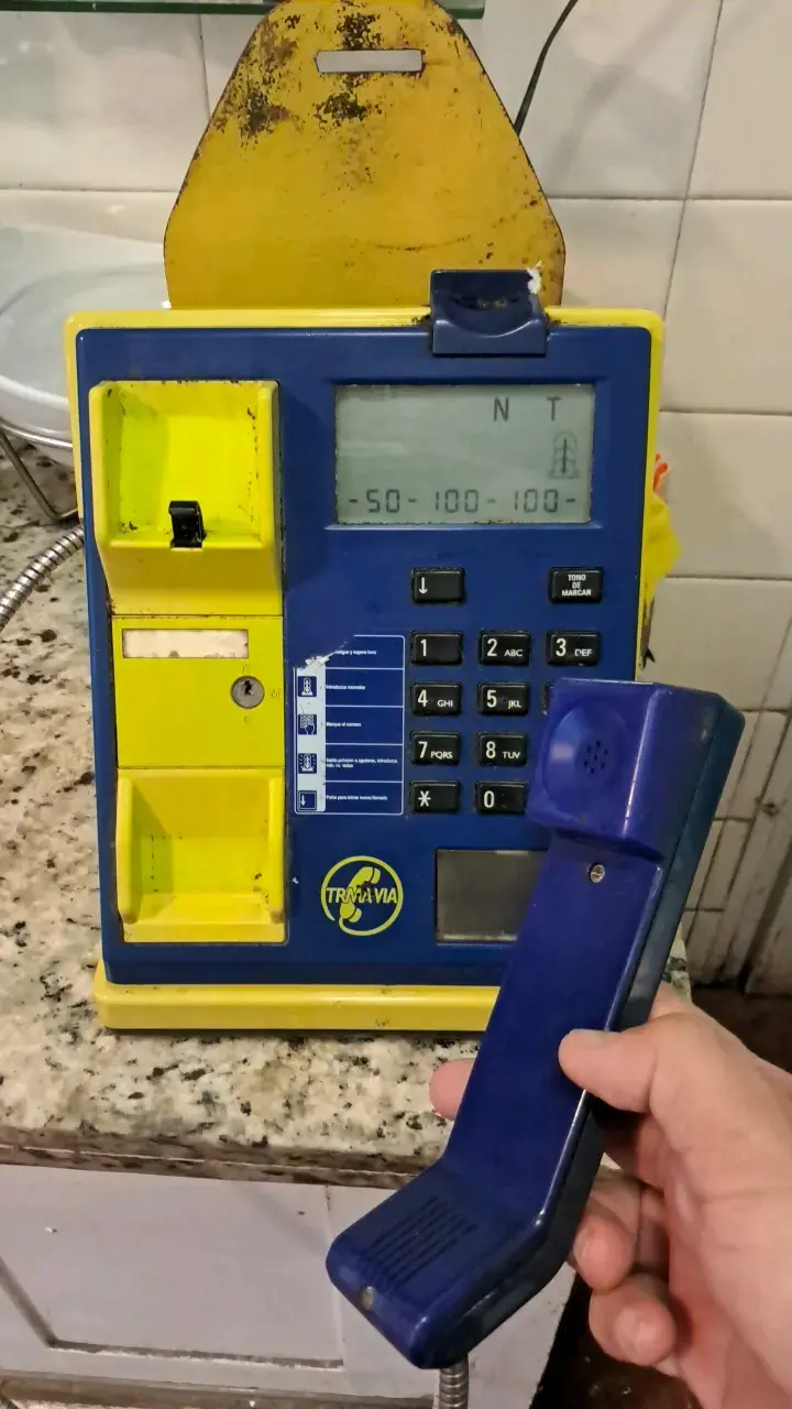 Teléfono original  público  azul y amarillo - 2
