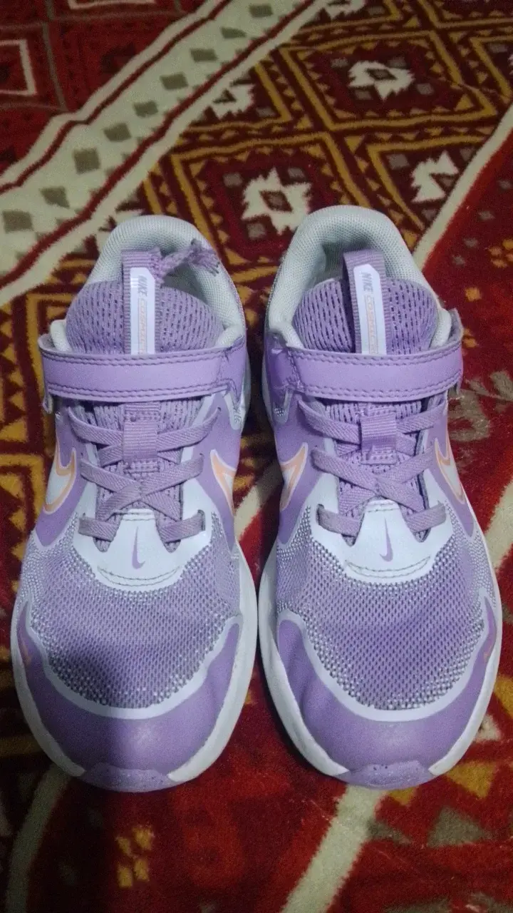 Zapatillas deportivas Nike para niños color lila - 1