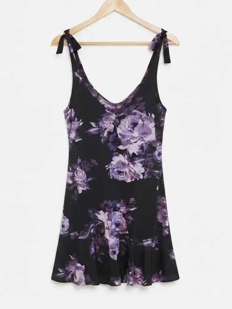 Vestido floral negro con lazos en los hombros