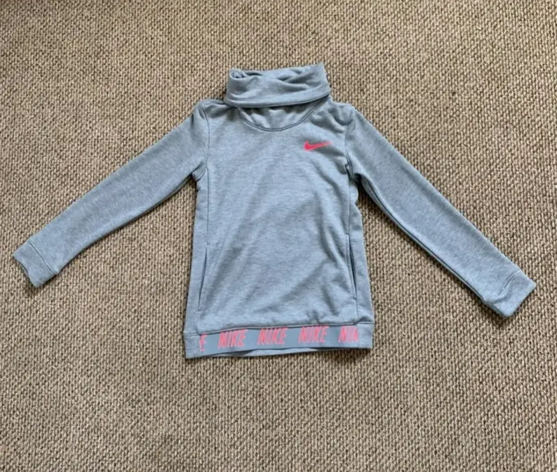 Polera Nike Dri-Fit Gris para Mujer - 1