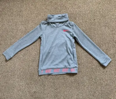 Polera Nike Dri-Fit Gris para Mujer - miniatura 1