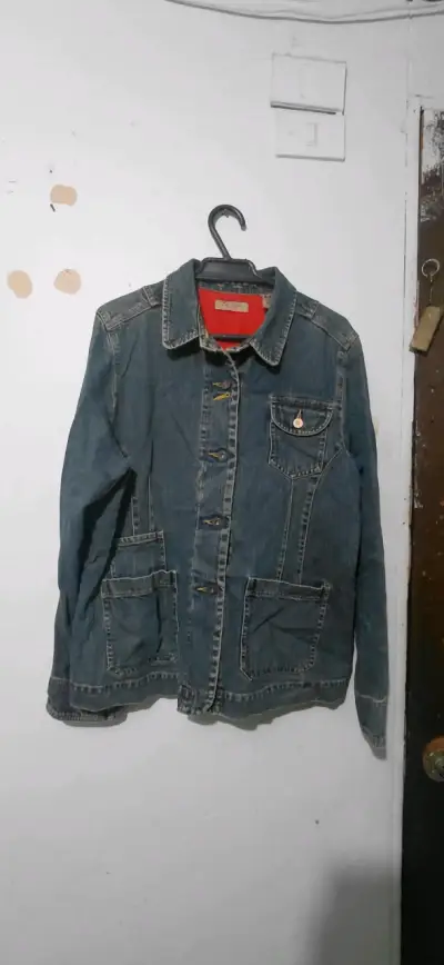 Chaqueta de mezclilla azul con bolsillos - miniatura 1