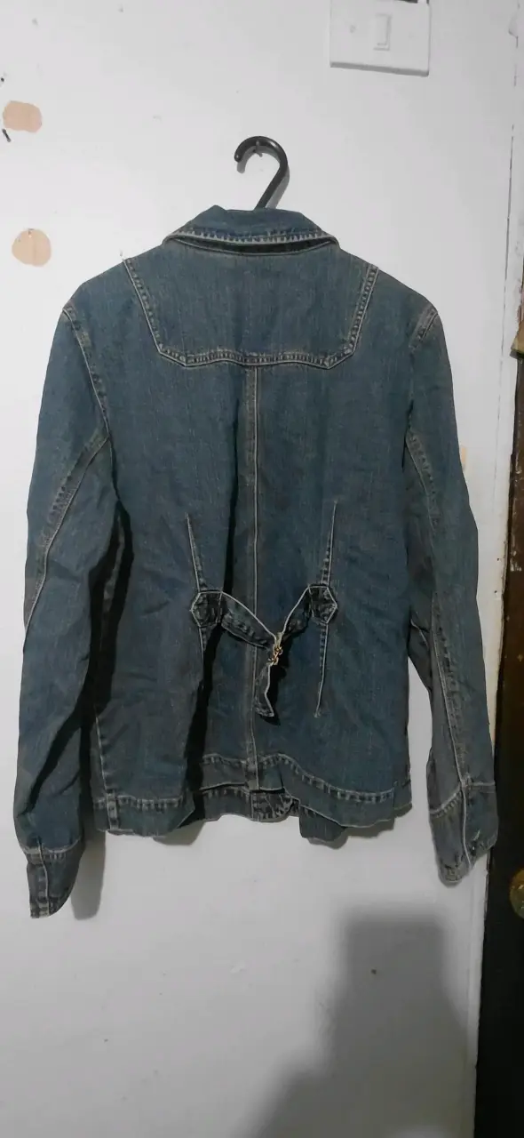 Chaqueta de mezclilla azul con bolsillos - 2