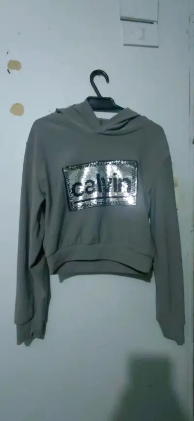 Polerón con capucha y lentejuelas Calvin - miniatura 1