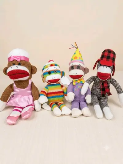 Set de 4 monos de peluche de colores - miniatura 1