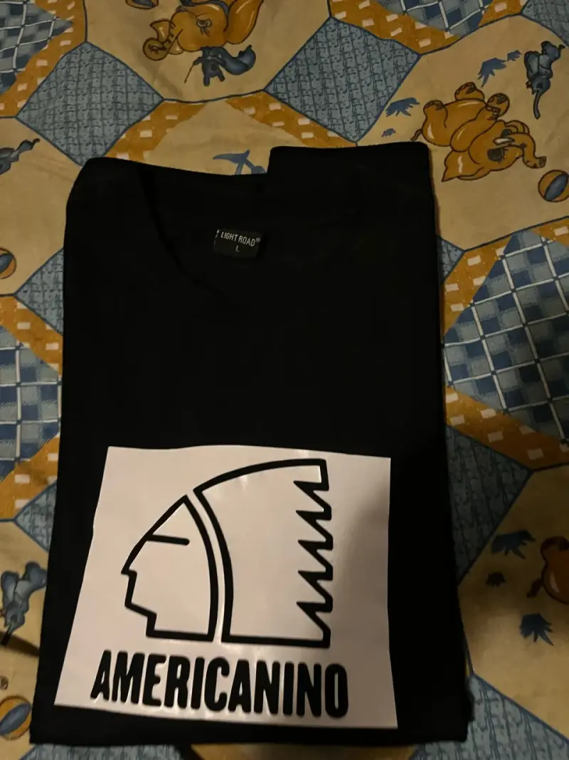 Polera negra Americano talla L - 1