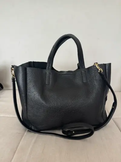 Bolso de cuero negro con correa ajustable - miniatura 1