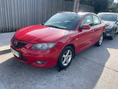 Mazda 3 Sedán Rojo año 2006 en Buen Estado - miniatura 6