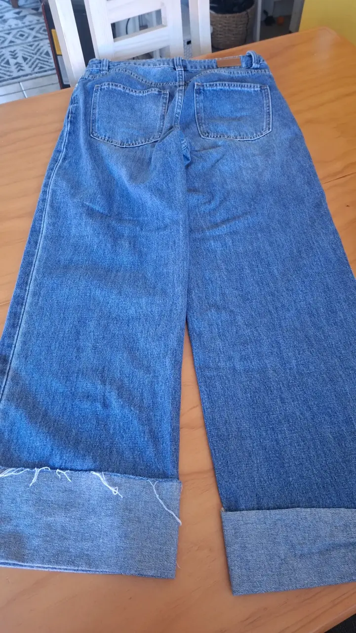 Jeans de mezclilla azul con dobladillo - 1