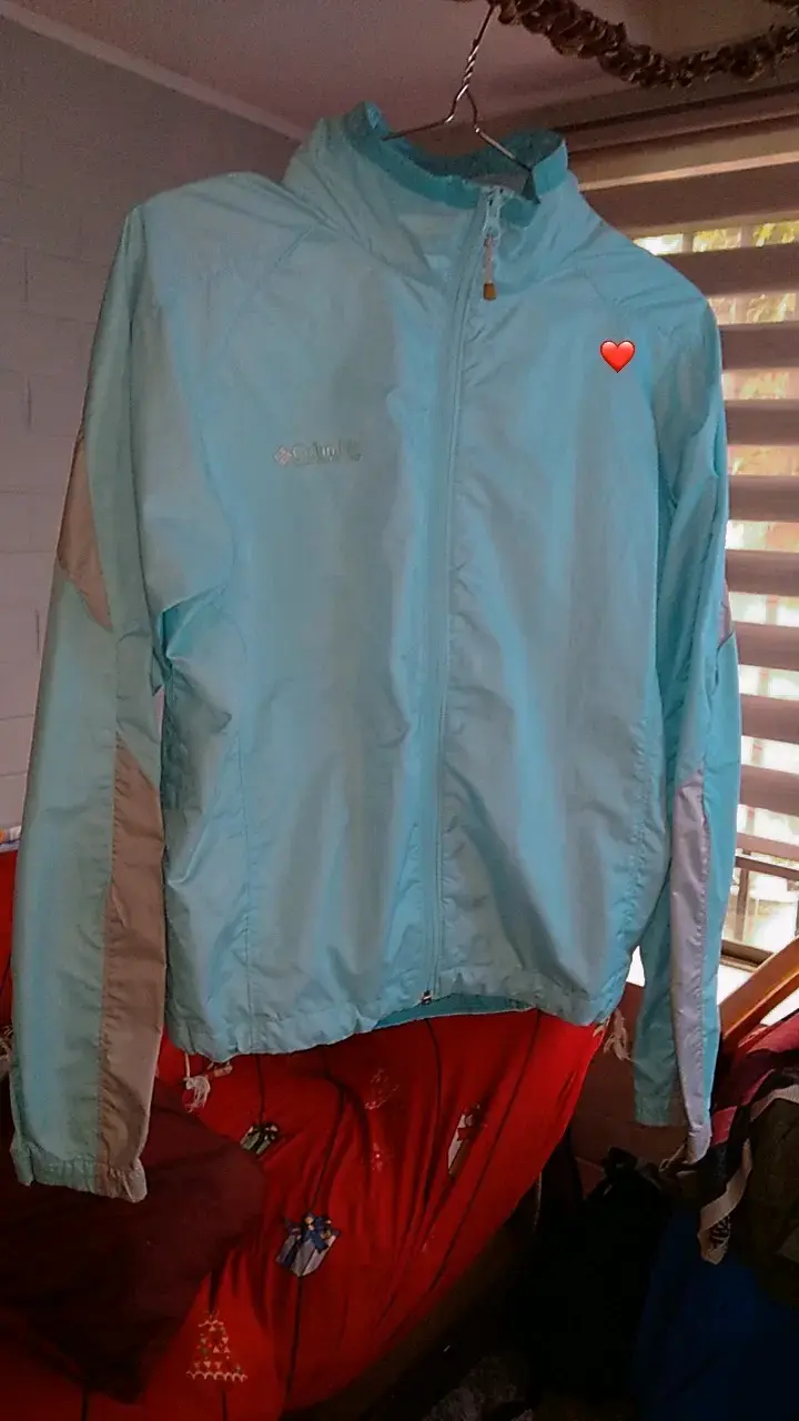 Chaqueta impermeable Columbia celeste para mujer