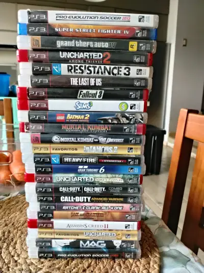 Consola PS3 con 24 juegos y 2 controles - miniatura 1