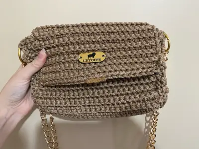 Cartera de mano tejida - miniatura 1