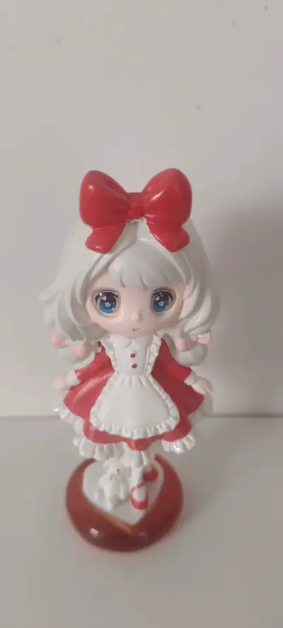Figura coleccionable Dress Up Party con lazo rojo - miniatura 1