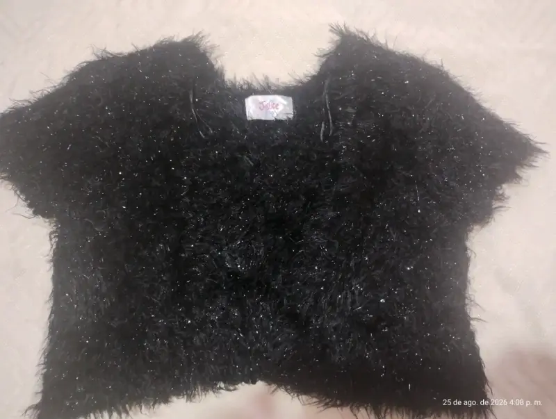 Chaleco peludo negro para niña marca Justice