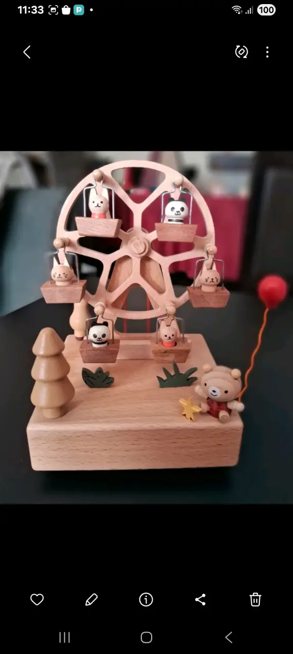 Caja musical giratorio de madera con animales