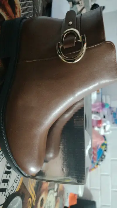 Botines de cuero marrón con hebilla metálica - miniatura 1