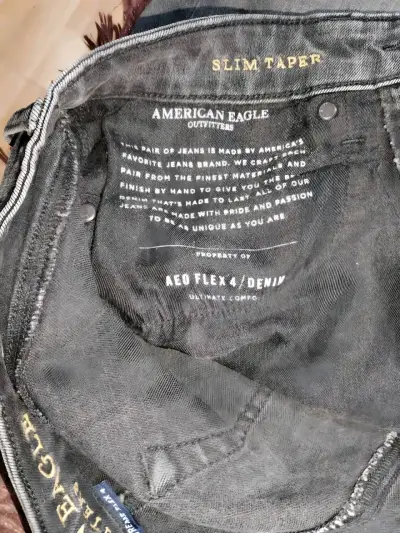 Jeans American Eagle Slim Taper Negro Desgastado - miniatura 3
