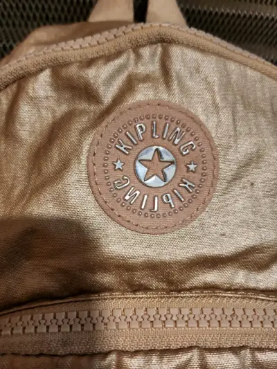 Mochila Kipling dorada con cierre resistente - miniatura 1