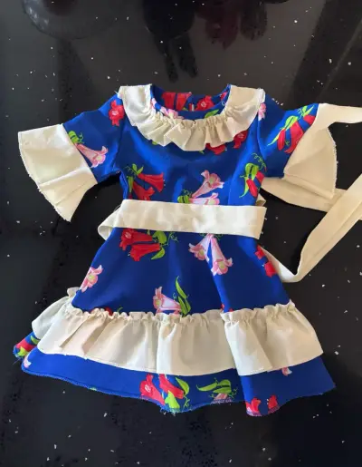 Vestido cueca infantil azul con flores y volantes - miniatura 1